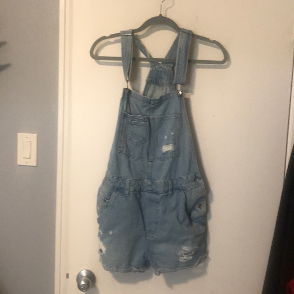 Denim distressed overalls